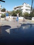 Επίστρωση της χαλαζιακής ψηφίδας η σμυρίδας σε άλλη περίπτωση για την ενδυνάμωση της τελικής επιφάνειας του βιομηχανικού δαπέδου